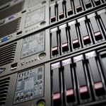 Servers stack with hard drives in a datacenter rack